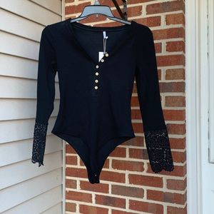 Women’s size large bodysuit in black